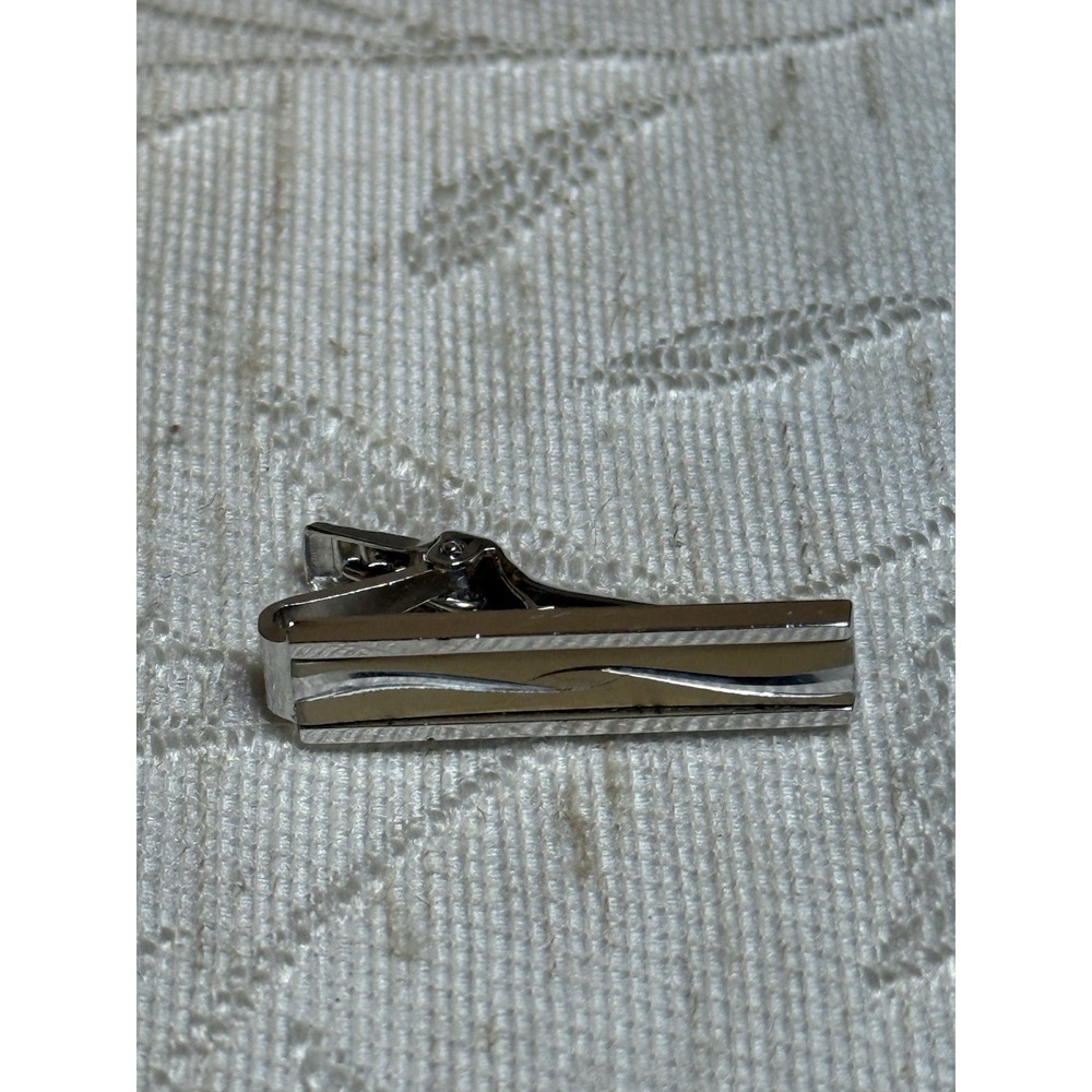 Vintage Anson silver and gold‎ tone tie clip with a modernist swooping design
